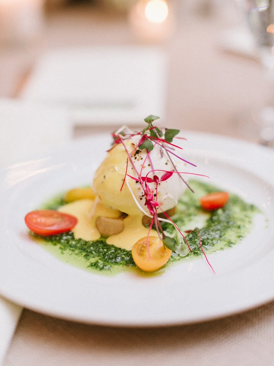 A white plate with a plate of food on it.