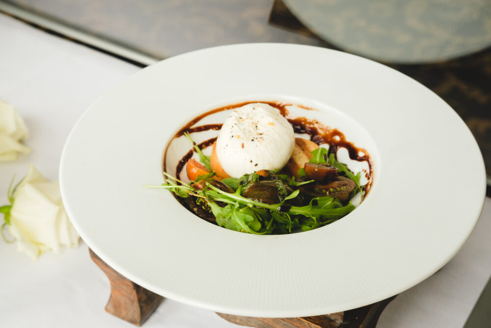 A white plate with food on it.